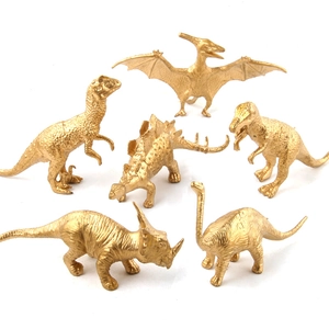 14-piece golden dinosaur toy set including T-Rex and Pterosaur for party decoration