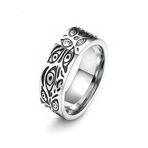 Macro view of vintage silver titanium steel ring with unique engraved eye patterns