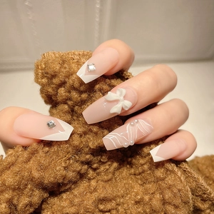 Press On Nails French Tip Avec Noeud 3D Strass Künstliche Perle Nude Rose Longue Forme Trapèze Faux Ongles