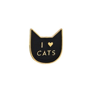 Detailed close-up of a black cat enamel pin with I Love Cats gold lettering and finish