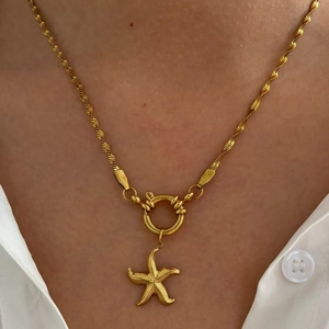 French style gold starfish necklace with pearl accents and large spring clasp closure