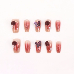 Handmade coffin press-on nails with 3D camellia roses, pearls, and glitter gradient finish