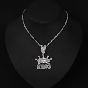 Hip hop silver KING crown pendant necklace with sparkling crystals on black model
