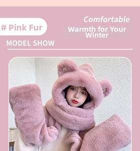 Detail of pink fleece hooded scarf with cute bear ears and soft faux fur lining