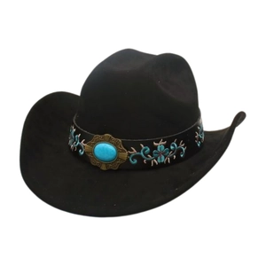 Detailed macro view of black felt cowboy hat with turquoise ethnic embroidery and stone