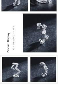 Macro detail of various 925 sterling silver ear cuffs with cubic zirconia inlays