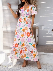 Detail of the V-neck and ruffled short sleeves on this floral bohemian maxi dress