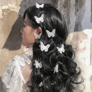 Elegant 3D white embroidered butterfly hair clips set on long wavy hair for women