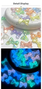 Luminous resin bow beads showing glowing effect in the dark versus daylight colors