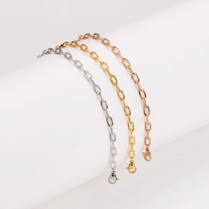 Textured stainless steel bracelets in silver, gold, and rose gold with lobster clasp