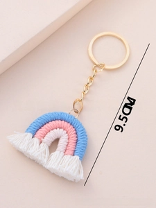 Handmade woven rainbow keychain with pastel cotton threads and golden metal ring