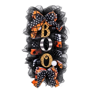 Halloween wreath door hanging with black mesh and decorative BOO wooden letters