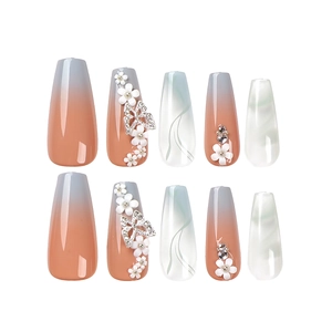 Long coffin gradient press-on nails with white 3D flowers and silver butterfly charms