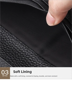 Macro detail of black litchi leather edge and striped fabric lining with neat stitching
