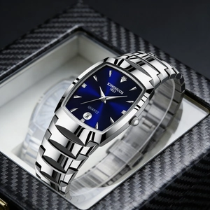 Macro shot of silver quartz watch with a blue dial and date display in a black gift box