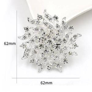 Elegant silver flower brooch with sparkling white crystals, size 62mm by 62mm