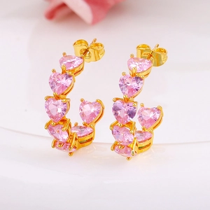 Elegant gold-plated hoop earrings featuring pink heart-shaped zircon stones for women