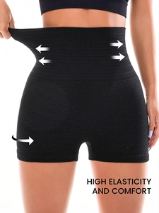 Black high-waisted yoga shorts with honeycomb texture and high elasticity for tummy control