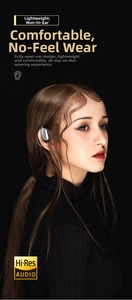 Detail view of black OWS open-ear sports headphones with green LED light and Hi-Res audio