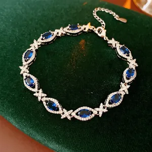 Luxury vintage silver bracelet with oval blue zircon and sparkling diamond accents