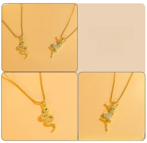 Detail of gold snake and ballerina pendants with micro-pave cubic zirconia accents