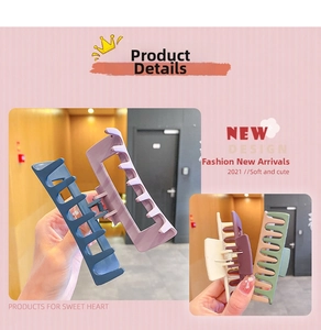 Detail view of large matte hair claws in various colors showing non-slip teeth design