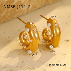 Detail of 18K gold-plated C-shape earrings with pearls and crystals, weight 13.2g