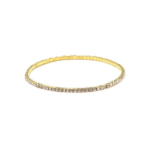 Macro shot of single row 2mm gold stretch bracelet with sparkling crystal rhinestones