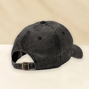 Detail view of the vintage washed cotton baseball cap with adjustable metal buckle back
