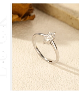 Macro shot of marquise-cut stone ring with minimalist S925 sterling silver band