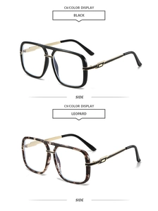 Detail view of double bridge sunglasses in black and leopard print with gold metal temples
