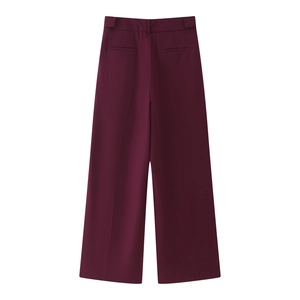 Back view of burgundy wide-leg trousers featuring belt loops and crisp pressed pleats
