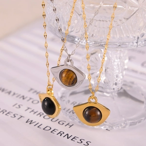 British retro titanium steel fan-shaped pendant necklace with tiger eye and black agate stone