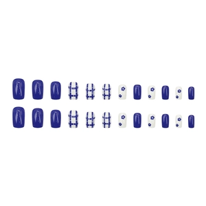 Klein blue and white checkered press-on nails with floral patterns in 24-piece set