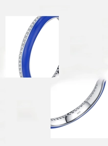 Close-up of S925 sterling silver ring showing blue enamel detail and 5A zircon inlay