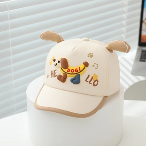 Detail view of toddler baseball cap featuring 3D dog ears and cartoon print on canvas