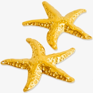 Macro shot of two golden starfish pendants with realistic 304 stainless steel texture