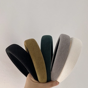 Padded ribbed knit headbands in five versatile colors for a high-volume hair look