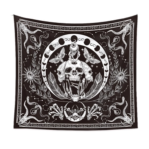 Detailed view of Gothic tapestry with triple skull, realistic eye and moon phases