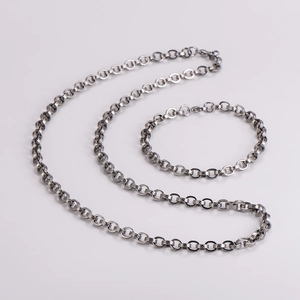 Sleek silver textured link necklace and bracelet set in minimalist stainless steel