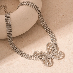 Luxurious silver-tone four-row rhinestone choker necklace with a crystal butterfly pendant