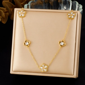 Elegant gold-plated stainless steel necklace with five sparkling crystal flower pendants