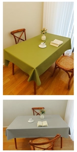 Detailed texture showing waterproof cream faux leather tablecloth in green and gray colors