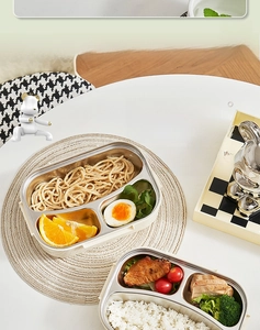 Three-grid 304 stainless steel lunch box showing separated food compartments