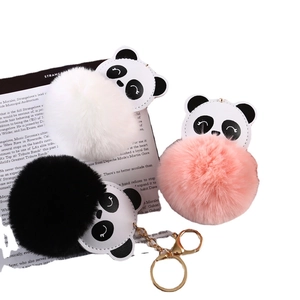 Panda faux fur pompom keychain set in white, black and pink with gold metal rings