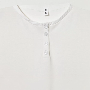 White cotton Henley dress with batwing sleeves and buttoned neckline in size S