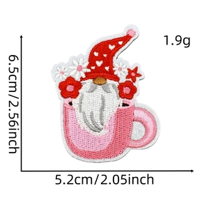 Detail view of pink gnome embroidery patch with measurements 6.5cm by 5.2cm