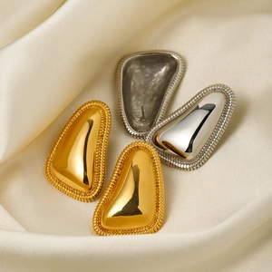 Polished 18k gold and silver stainless steel triangle earrings with wavy edges