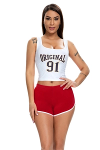 Detail of red athletic shorts with white trim and white racerback crop top for workout
