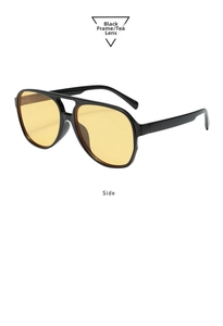 Side view of retro double-bridge aviator sunglasses with black frame and yellow lenses